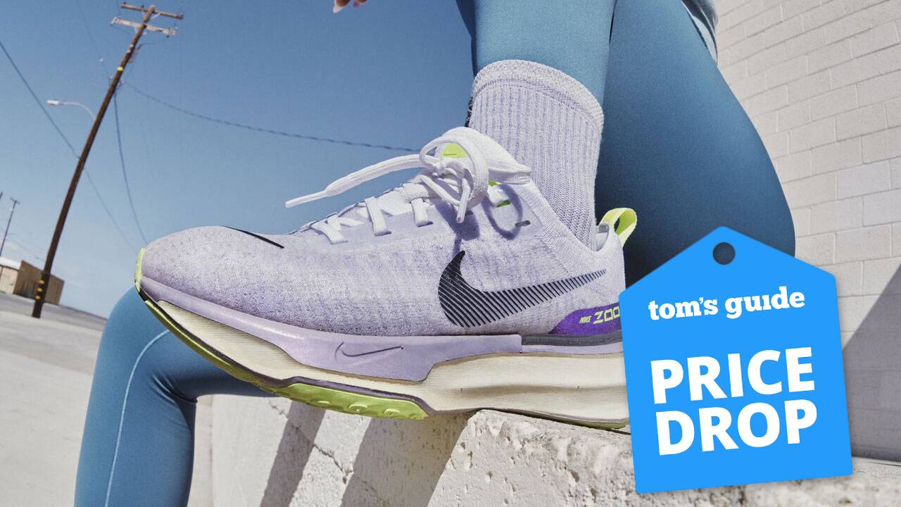 a side-on view of the Nike Invincible 3 in a women's colorway